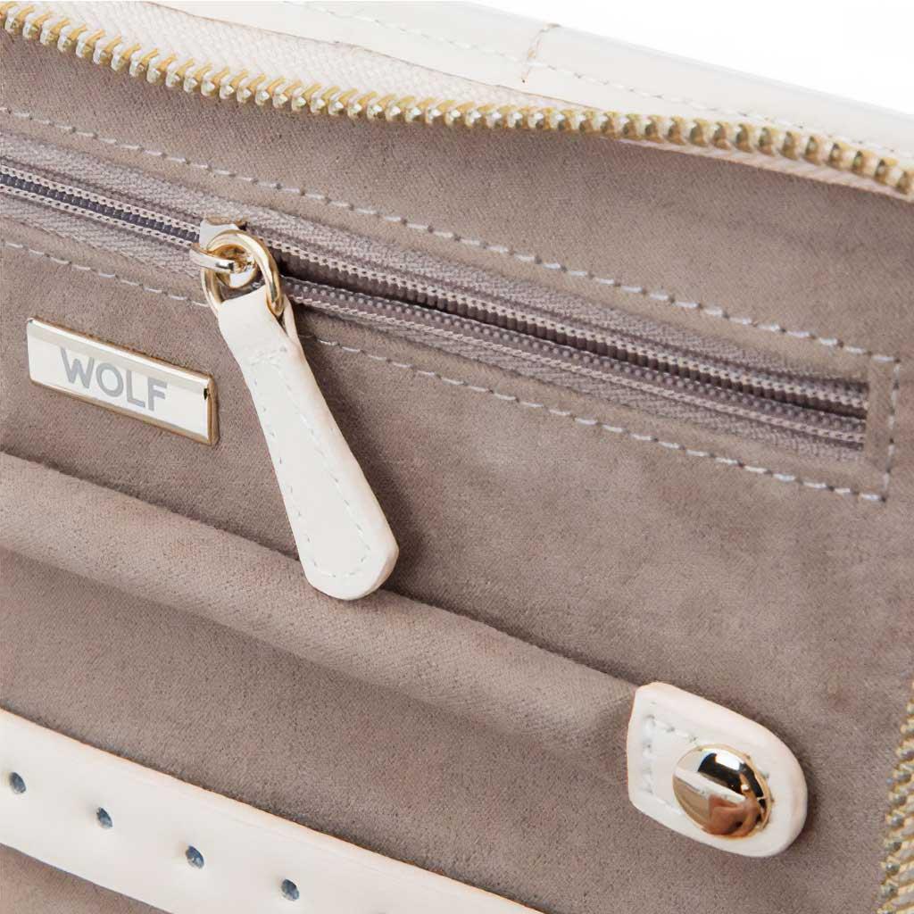 earring, ring and zipper storage with ivory leather & tan interior
